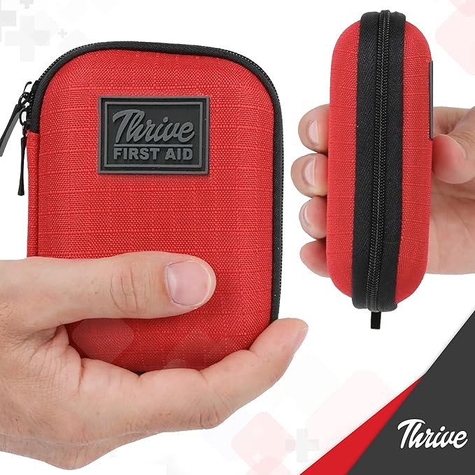 Thrive Travel Essentials Mini First Aid Kit - 66-Piece, Red Shell Case - Hiking, Camping & Cruise Essentials - Mini Medicine Kit